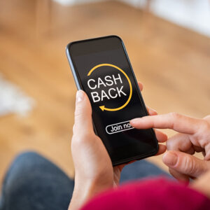 Woman using cashback app on phone